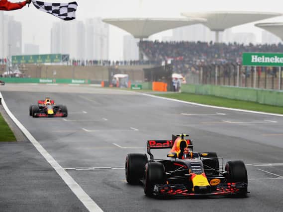 Max Verstappen crosses the line to take third place at the Chinese Grand Prix