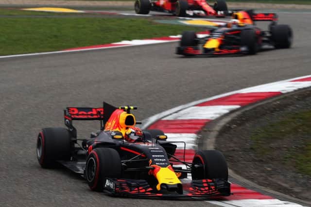 Max Verstappen held off Daniel Ricciardo in the closing stages in China