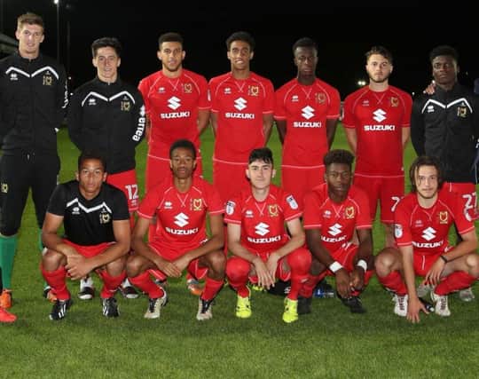 The academy players and graduates in the squad at Newport County. Pic: MK Dons