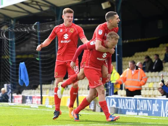 MK Dons celebrate Ben Reeves' goal at Southend