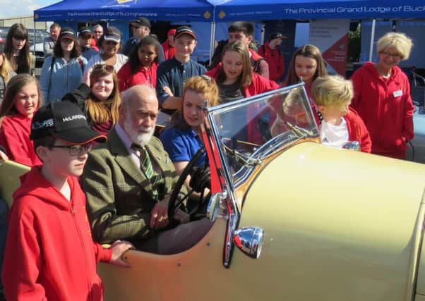 Prince Michael and young carers at Silverstone