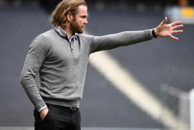 Robbie Neilson is yet to see Scott Wootton play