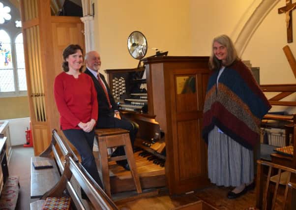 Willis Pipe Organ - Anna Page, Dave King and Lesley Salter with the plaque on the organ about the project.