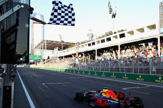 Ricciardo takes the chequered flag