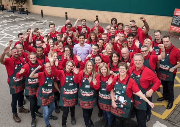Mark Webber with Bunnings staff at yesterday's launch