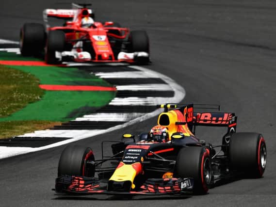 Verstappen leads Vettel in the early laps