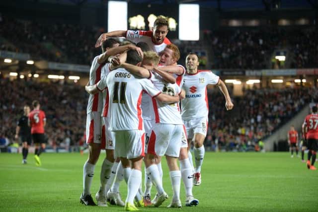 MK Dons beat Manchester United 4-0