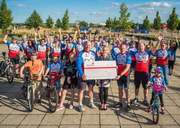Broughton Cycling Group present cheque to Thames Valley Air Ambulance Oob_vzlBaQ3XRYkfT4F3