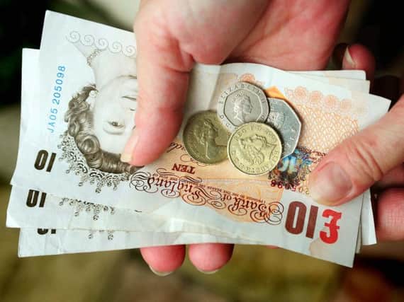 The government named more than 200 businesses today which underpaid workers the minimum or Living Wage