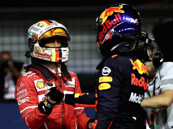 Max Verstappen and Sebastian Vettel congratulate each other after qualifying, but there would be fireworks between the pair 24 hours later