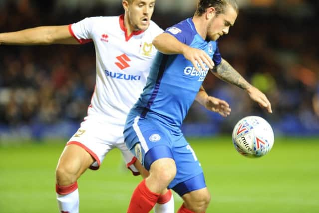 Wootton in action at the Abax Stadium against Peterborough