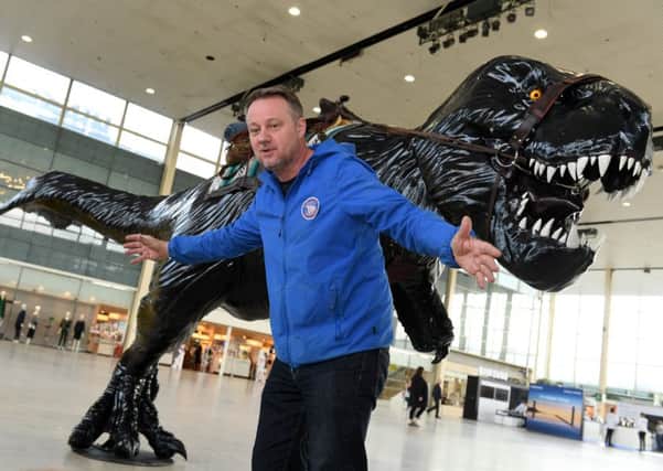 Jay Jay Burridge with his supersaur in Middleton Hall at centre:mk