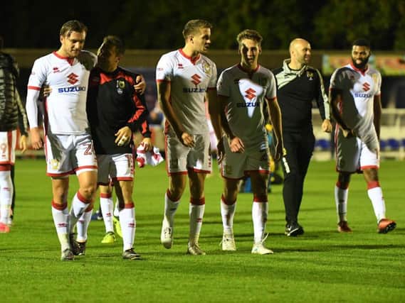 MK Dons celebrate their win over AFC W'don