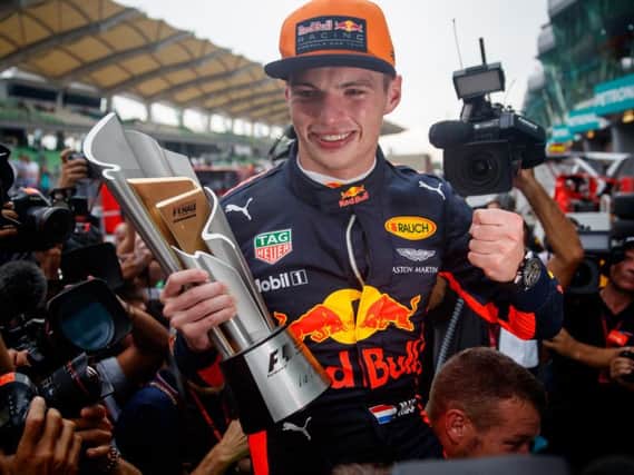 Max Verstappen celebrates his Malaysian GP victory