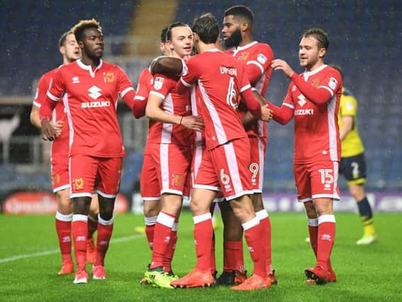 MK Dons beat Oxford United 4-3 in a thriller on Tuesday night to progress in the Checkatrade Trophy