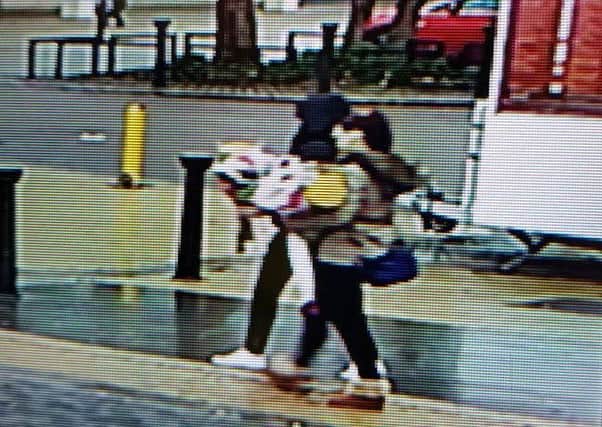 Two women were captured on CCTV stealing floral tributes to MK'spopular 'Jack the potato man' who died recently